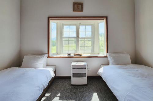 Sunshine Hakuba Ski-to-door by JAMSZ ROYALE