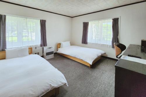 Sunshine Hakuba Ski-to-door by JAMSZ ROYALE