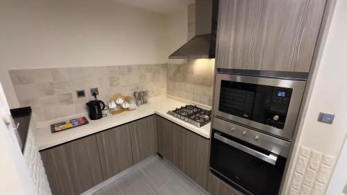 Kuchyň nebo kuchyňský kout v ubytování Walk-Inn Centaurus Apartments Islamabad