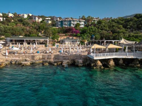 an aerial view of a resort on the water at Aquarius Hotel in Kas
