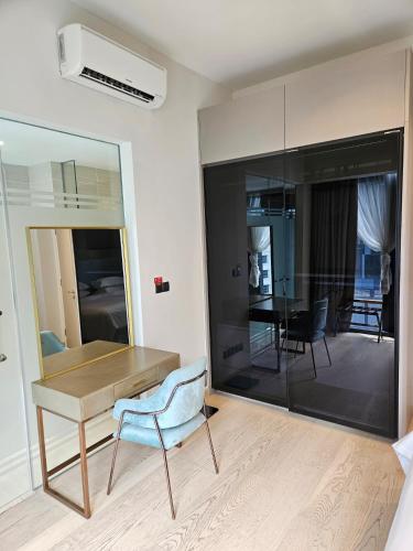 a room with a table and a chair and a dining room at Star Residence Pool View 2br Unit Floor 8 in Kuala Lumpur