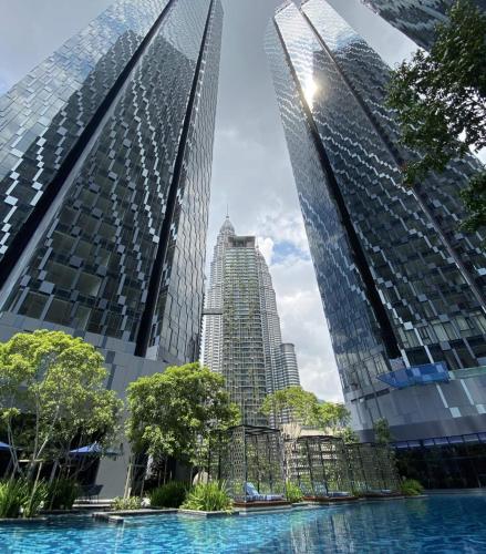 a view of two tall buildings in a city at Star Residence 2br Unit Floor 46 in Kuala Lumpur