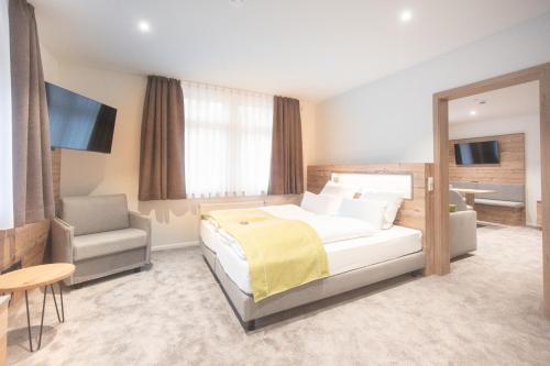 Postel nebo postele na pokoji v ubytování Hotel dasZimmermann