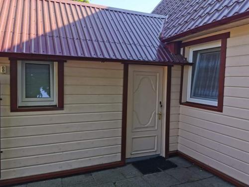 Imagen de la galería de Sodyba pas Babą - namas KLASIKA, en Palanga