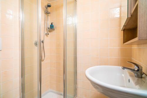 a bathroom with a shower and a sink at Casa Fabrizio in Taormina