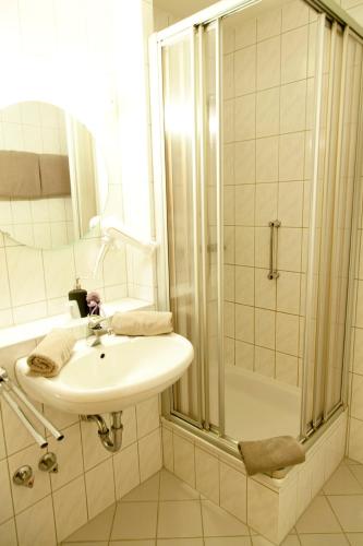 Koupelna v ubytování Hotel dasZimmermann