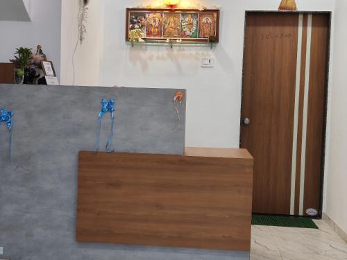 a counter in a room with a wooden door at Shri Resort & Lodging in Alta