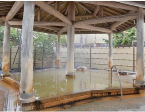 a covered area with a pool of water at 函館民泊イナンクル in Hakodate