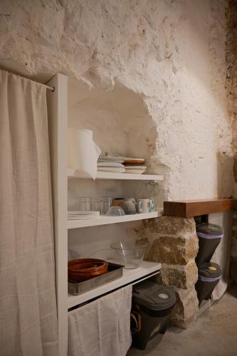 a bathroom with a sink and a toilet in a room at Ayamans Home Lloseta in Lloseta