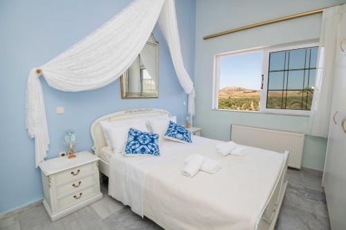 Кровать или кровати в номере Villa Blue Horizon- Creta