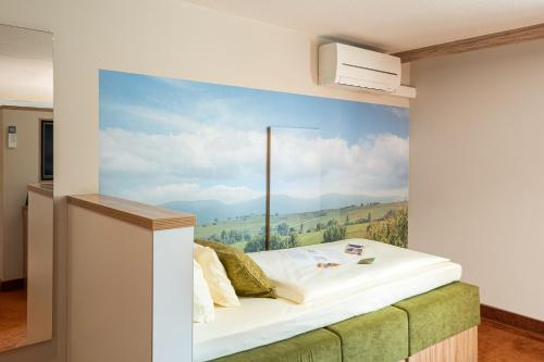 Letto o letti in una camera di Parkhotel Landau