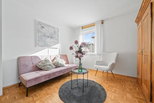 Гостиная зона в Apartment SEEwiese mit großem Garten und autemberaubenden Alpenpanorama
