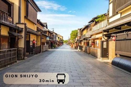 an empty street in a town with buildings at Hotel Amaranth Kyoto Gojo - Vacation STAY 19866v in Kyoto