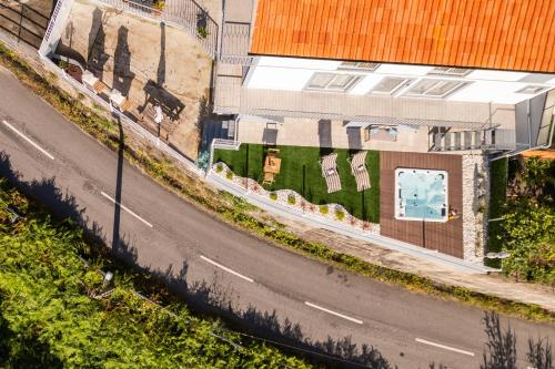 an overhead view of a road with a building at Host Wise - Solar de Pisões in Marco de Canaveses