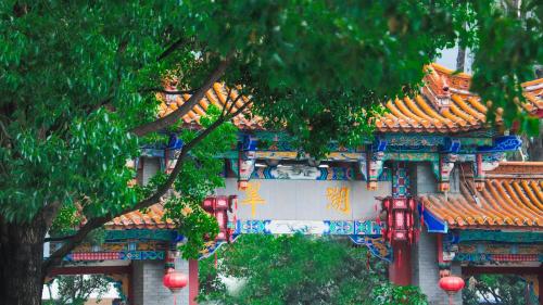 a building with chinese writing on the side of it at Crowne Plaza Kunming City Centre by IHG in Kunming