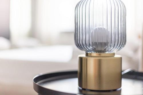 a close up of a light on a table at Arena 35 in Milan