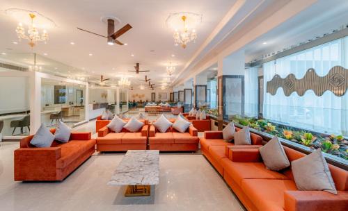 Un lugar para sentarse en Treebo Premium Omni Residency