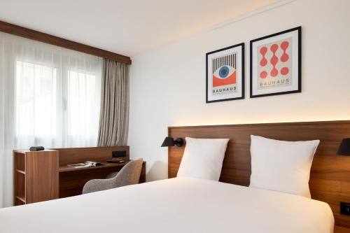 Cama o camas de una habitación en Timhotel Nation