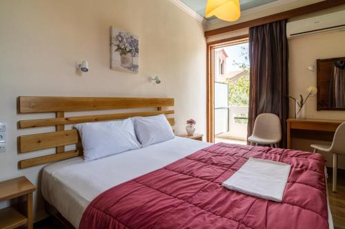 Postel nebo postele na pokoji v ubytování Hotel Hercules
