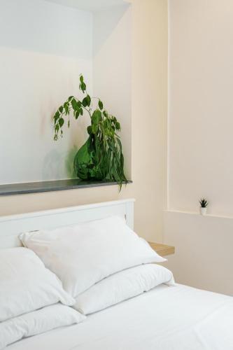 Ein Bett oder Betten in einem Zimmer der Unterkunft Il Poeta nella Vigna