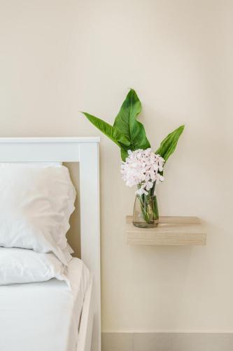 Ein Bett oder Betten in einem Zimmer der Unterkunft Il Poeta nella Vigna