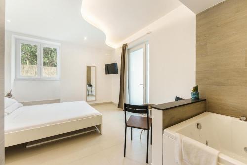 Ein Bett oder Betten in einem Zimmer der Unterkunft Il Poeta nella Vigna