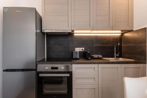 Η κουζίνα ή μικρή κουζίνα στο Penelope Apartments D