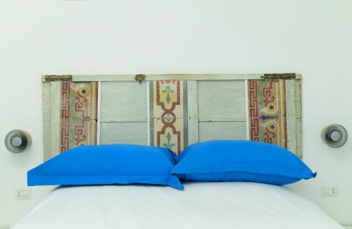 Postel nebo postele na pokoji v ubytování Bianco Pugliese B&B