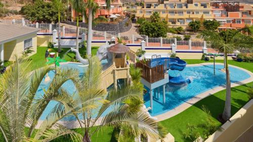 an aerial view of a pool with a water park at Gran Oasis Resort in Playa de las Americas