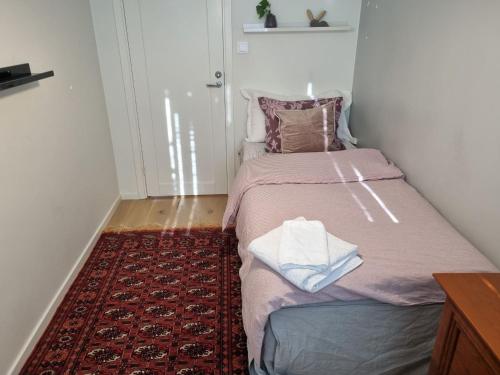 Кровать или кровати в номере The pink room