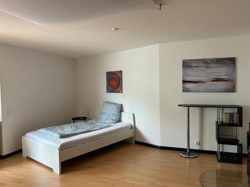 Postel nebo postele na pokoji v ubytování Apartment Weßling