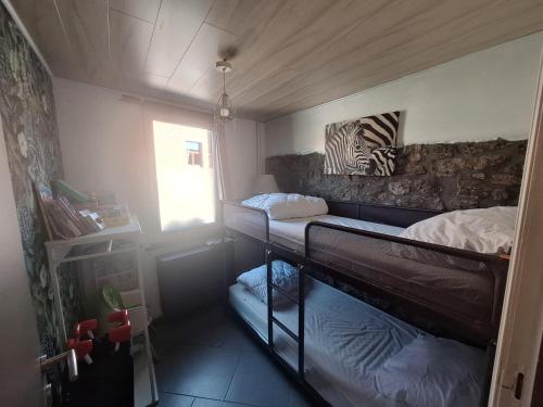 Postel nebo postele na pokoji v ubytování Chez Claire de lune