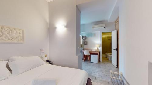 Letto o letti in una camera di Villa Gina