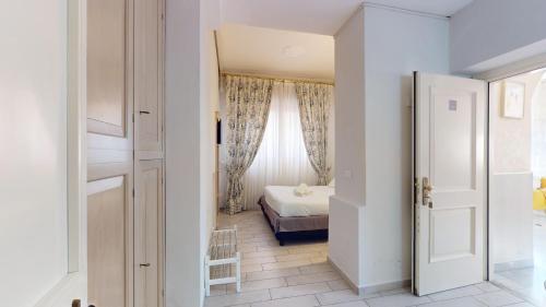 Letto o letti in una camera di Villa Gina