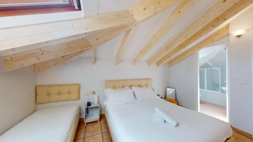Letto o letti in una camera di Villa Gina