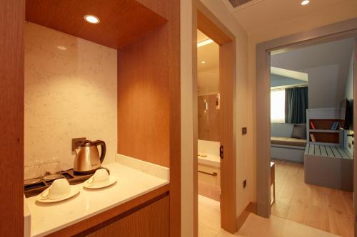 a kitchen with a tea kettle on a counter at Casa Lumar Luxury Lodging- Adult Only in Fethiye