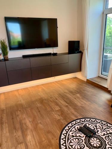 Et tv og/eller underholdning på Apartments Bouchon