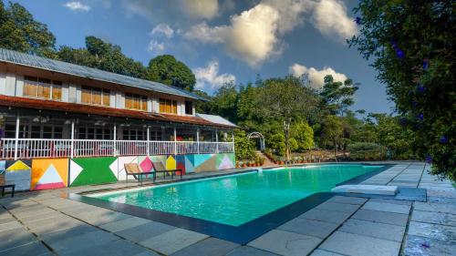 Bazén v ubytování Vythiri Holiday Resort, Wayanad nebo v jeho okolí