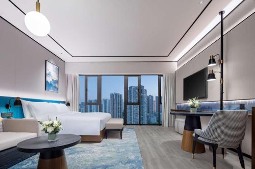 Μια τηλεόραση ή/και κέντρο ψυχαγωγίας στο Hilton Garden Inn Yichang Yiling