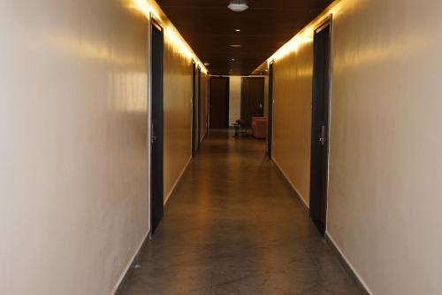 a hallway of an office building with a long corridor at VANTARA SUITEs in Vellore