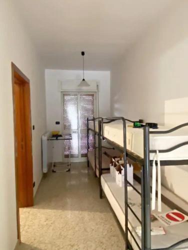 Ένα ή περισσότερα κρεβάτια σε δωμάτιο στο GIOIA House