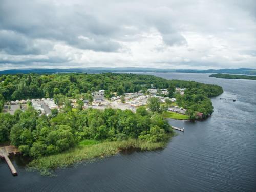 an aerial view of an island in the water at Castle Archdale Holiday Park in Enniskillen