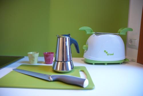 a kitchen counter with a blender and a knife at Ca' Venissa in Venice