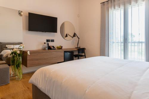Ένα ή περισσότερα κρεβάτια σε δωμάτιο στο B&B Locanda Forchir