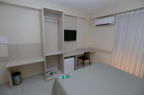 TV a/nebo společenská místnost v ubytování Stay Inn Hotel