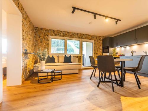 Posezení v ubytování NEW! Tevini Alpine Apartments by we rent