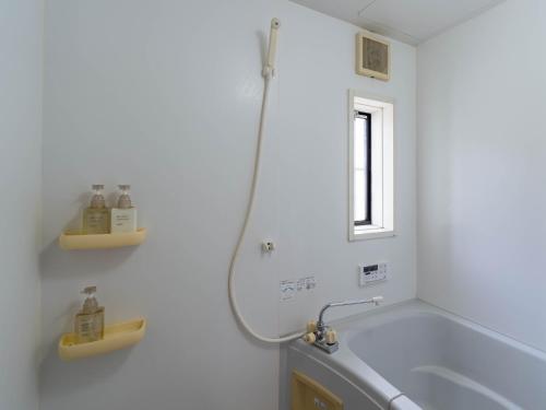 Ein Badezimmer in der Unterkunft utazu stop
