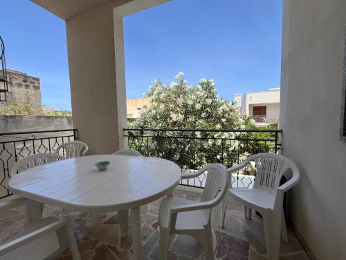 En balkon eller terrasse på Casa Finuzza