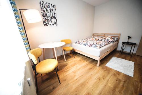Postel nebo postele na pokoji v ubytování Ferienwohnung in Lengefeld