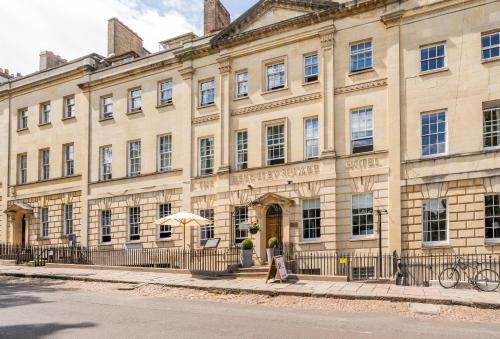 a large building on the side of a street at The Berkeley Square Hotel Bristol in Bristol